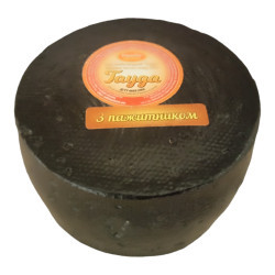 "Сир твердий "Гауда" 50 %  з пажитником  (1,2-1,5кг) ст